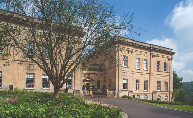 Driveway and flowerbed with Bailbrook House in the background